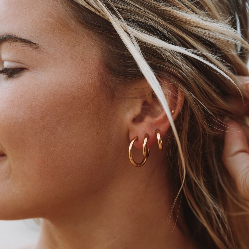 Pendientes de aro triples dorados