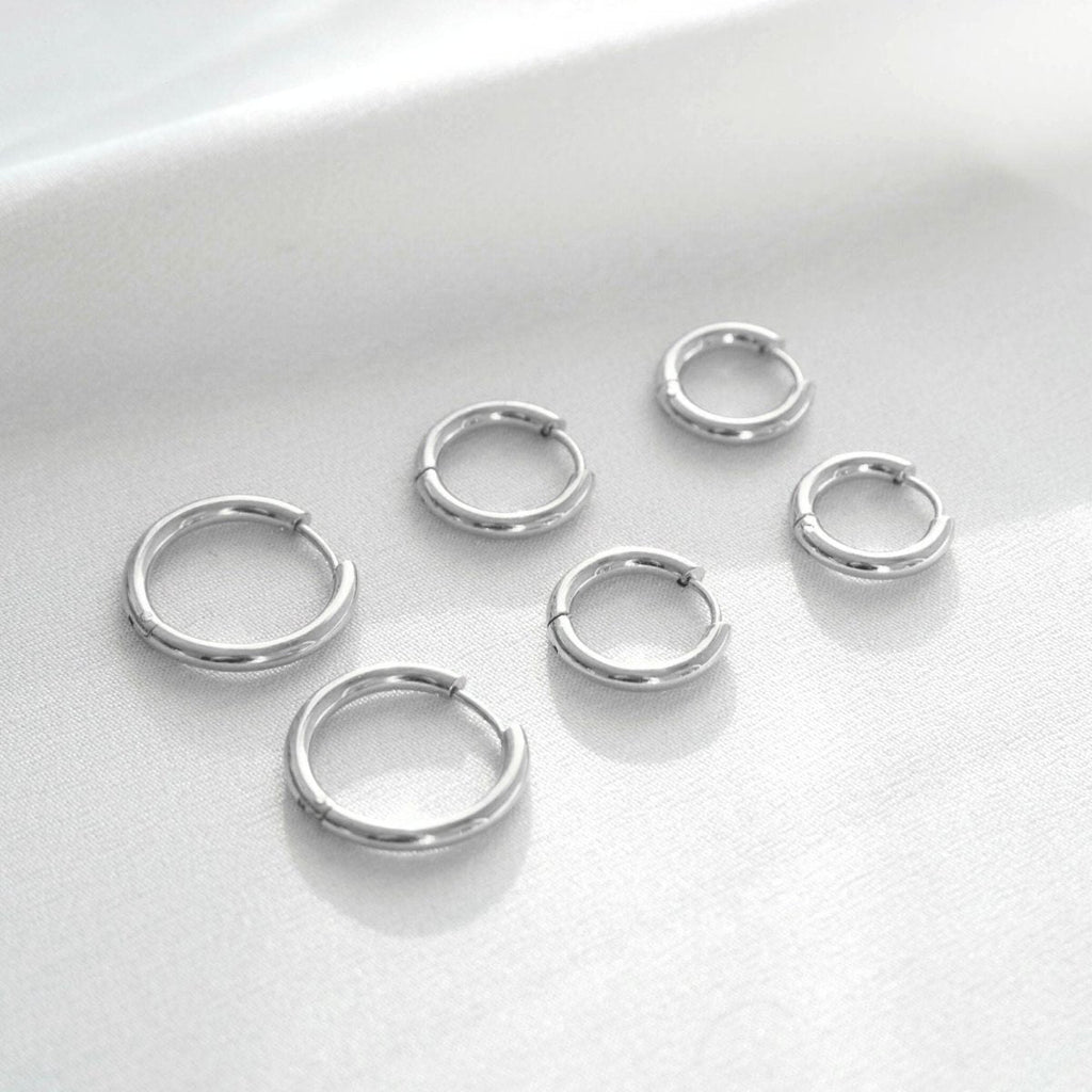 Pendientes de aro triples dorados