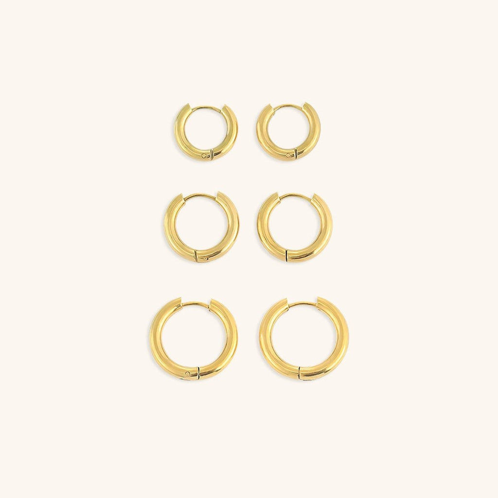 Pendientes de aro triples dorados